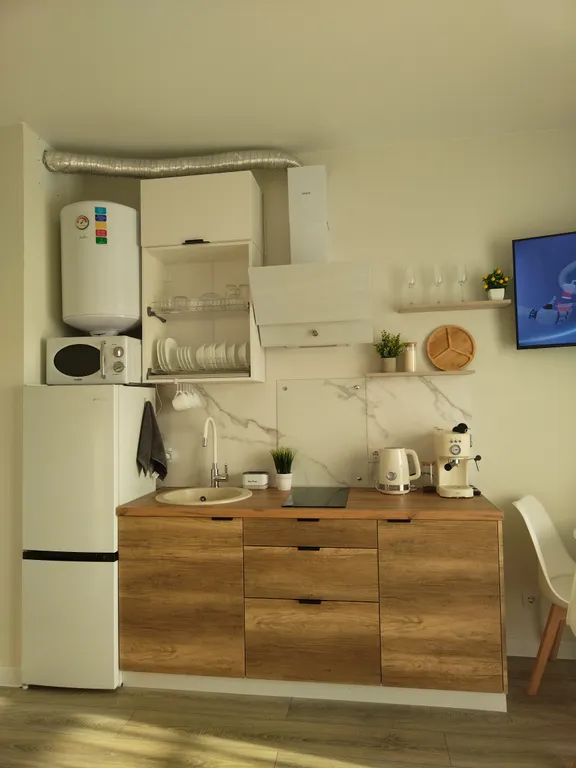 Студия комфорт с видом на горы и бассейнами во дворе