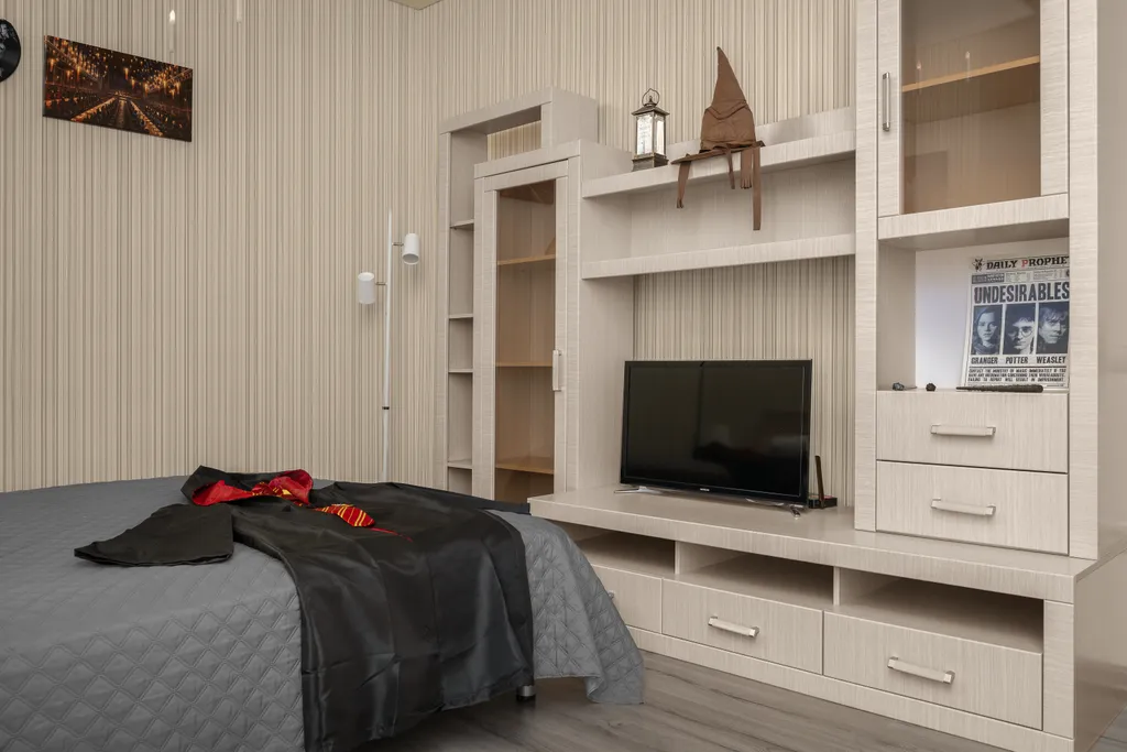 Уютная квартира с большой панорамной лоджией и видом на стадион