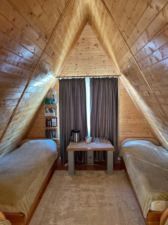 Уютная спальня на мансарде