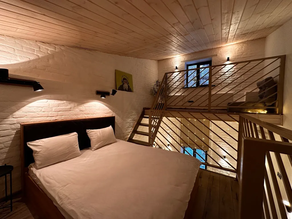 Уютные трехуровневые апартаменты в стиле Лофт в центре города Уровни