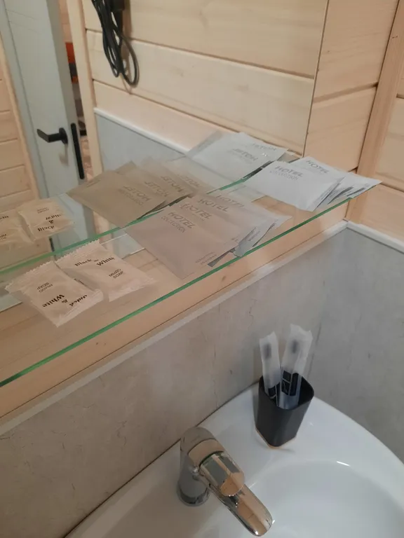 Уютный четырехместный Домик де-люкс с отдельными кроватями