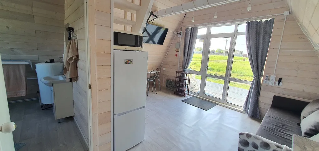 Тpеугольный дом A-frаmе с видом на море