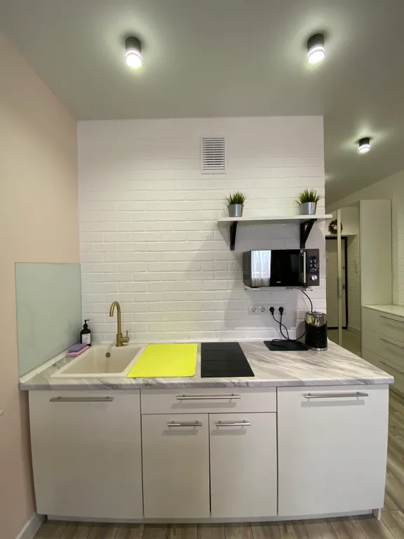 Уютная студия с видом на город