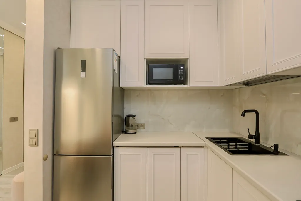 Апартаменты с видом на пруд и историческую часть города