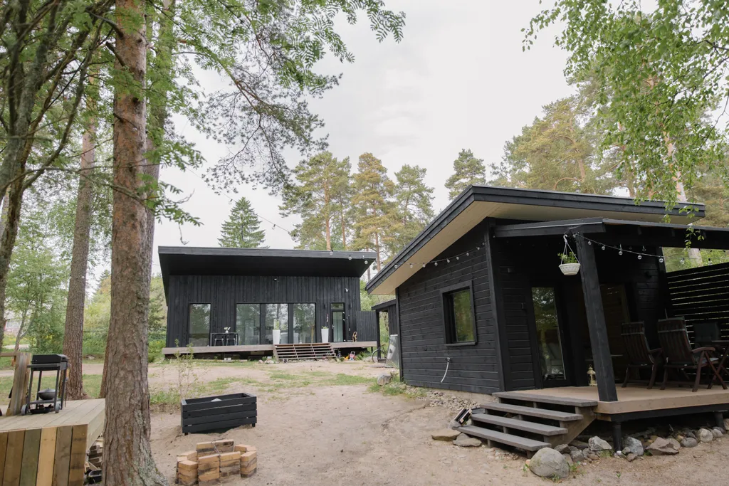 Стильный дом на берегу Ладожского озера с панорамным видом