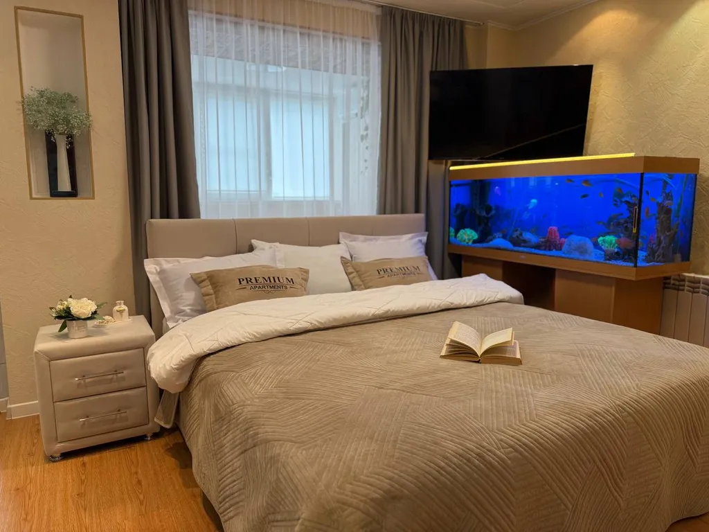 Апартаменты с аквариумом и видом на парк