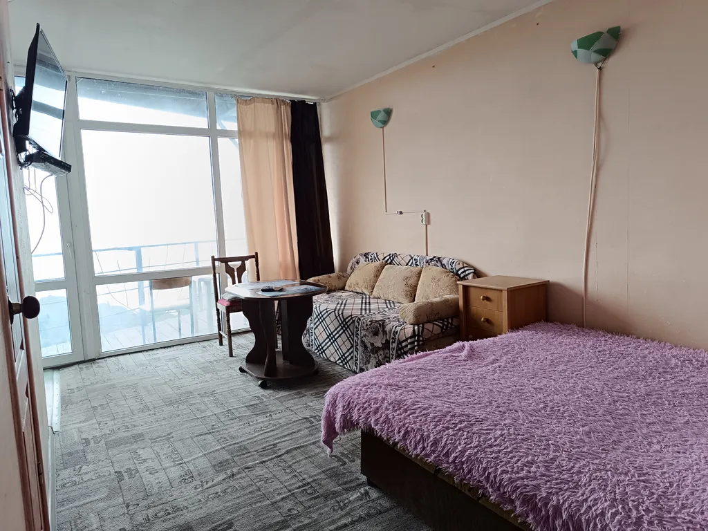 Студия с видом на море