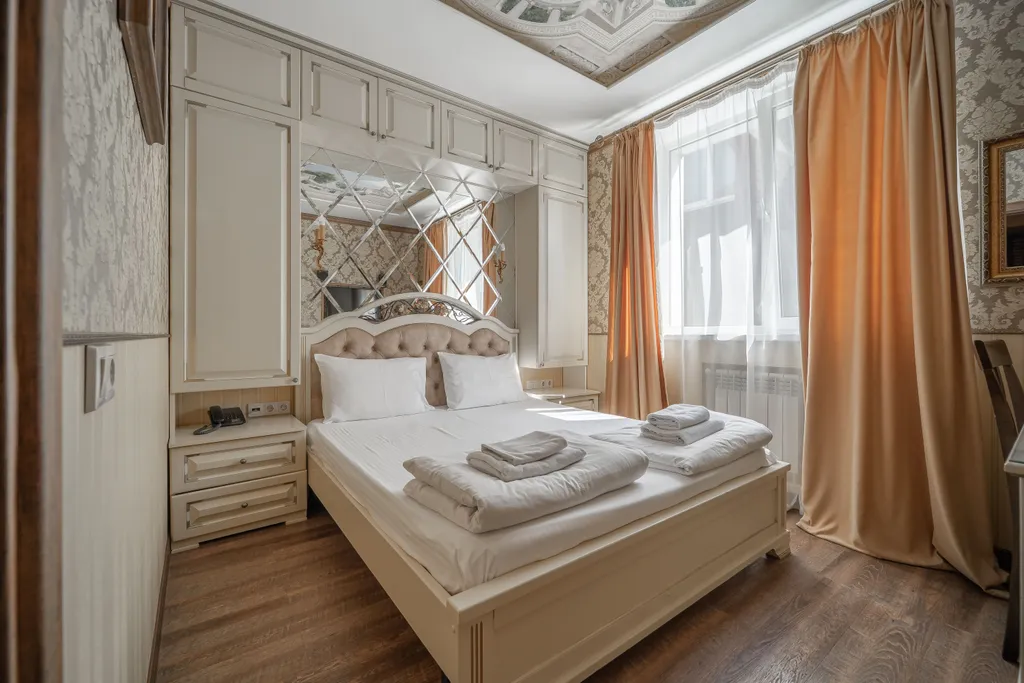 Двухместная комната с двуспальной кроватью НР