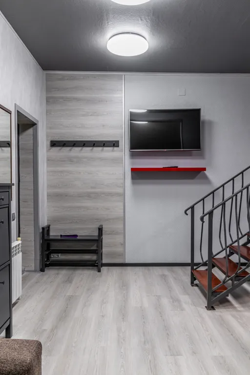 Двухуровневая квартира-студия с отдельной спальней