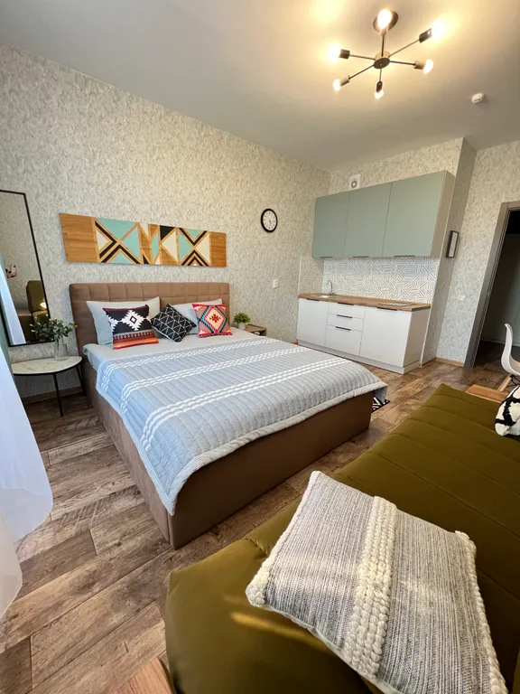 Студия на высоком этаже в новом доме