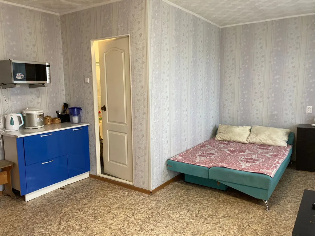 Уютная гостиная с лоджией