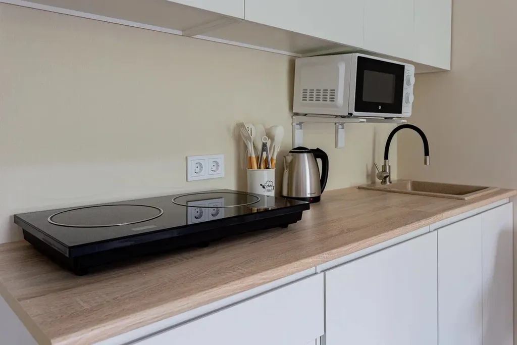 Белые апартаменты - студия на Искре