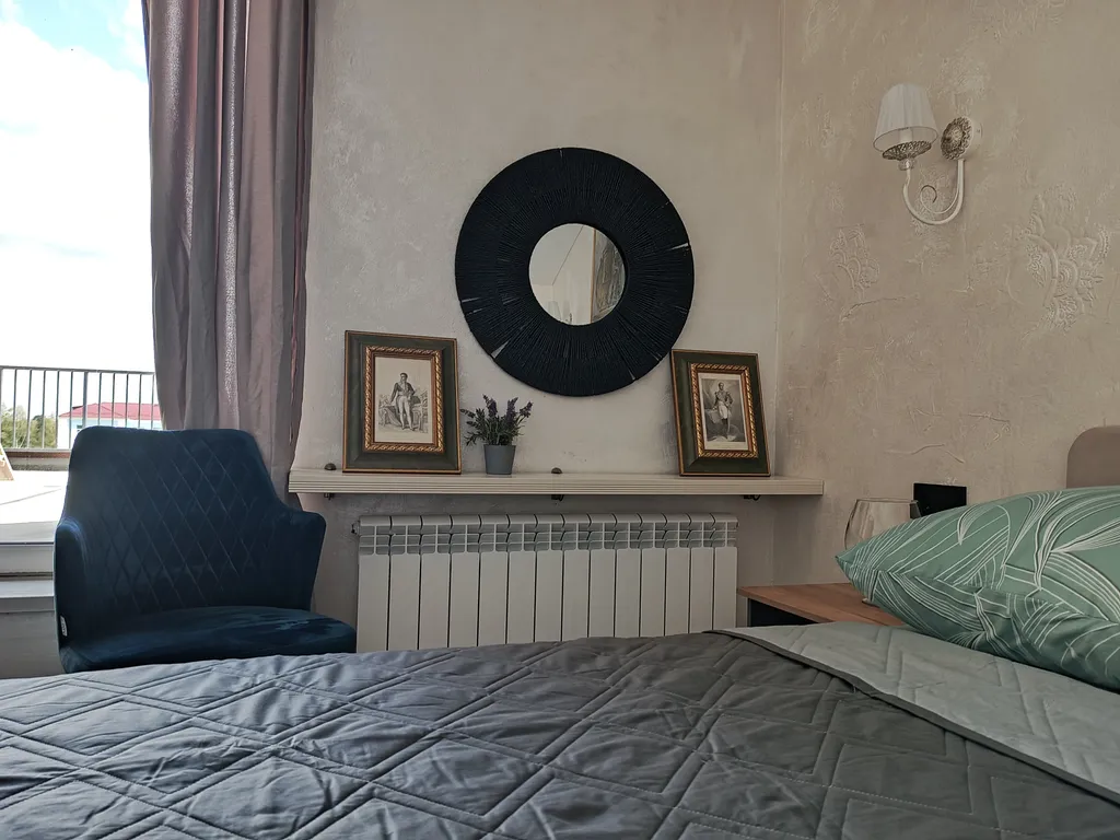 Атмосферная двухуровневая квартира с видом на Петропавловский парк