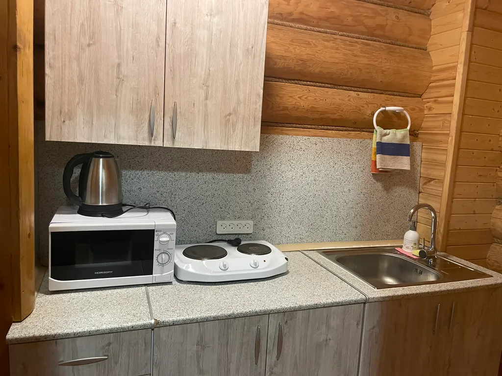 База отдыха Заполек. Коттедж с видом на озеро Селигер.