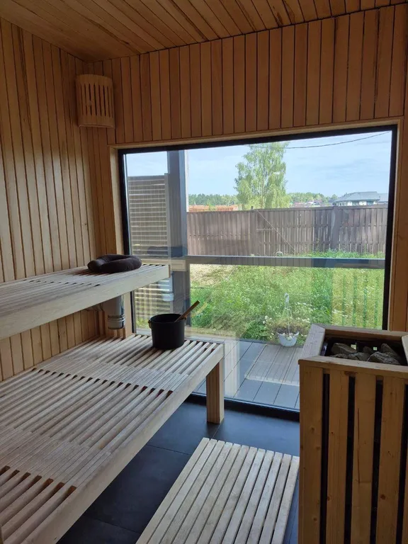 Новый стильный дом с купелью и сауной