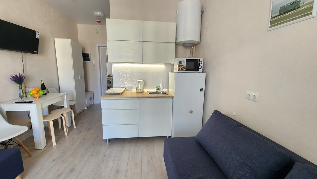 Студия в новом корпусе с видом на бассеин и горы