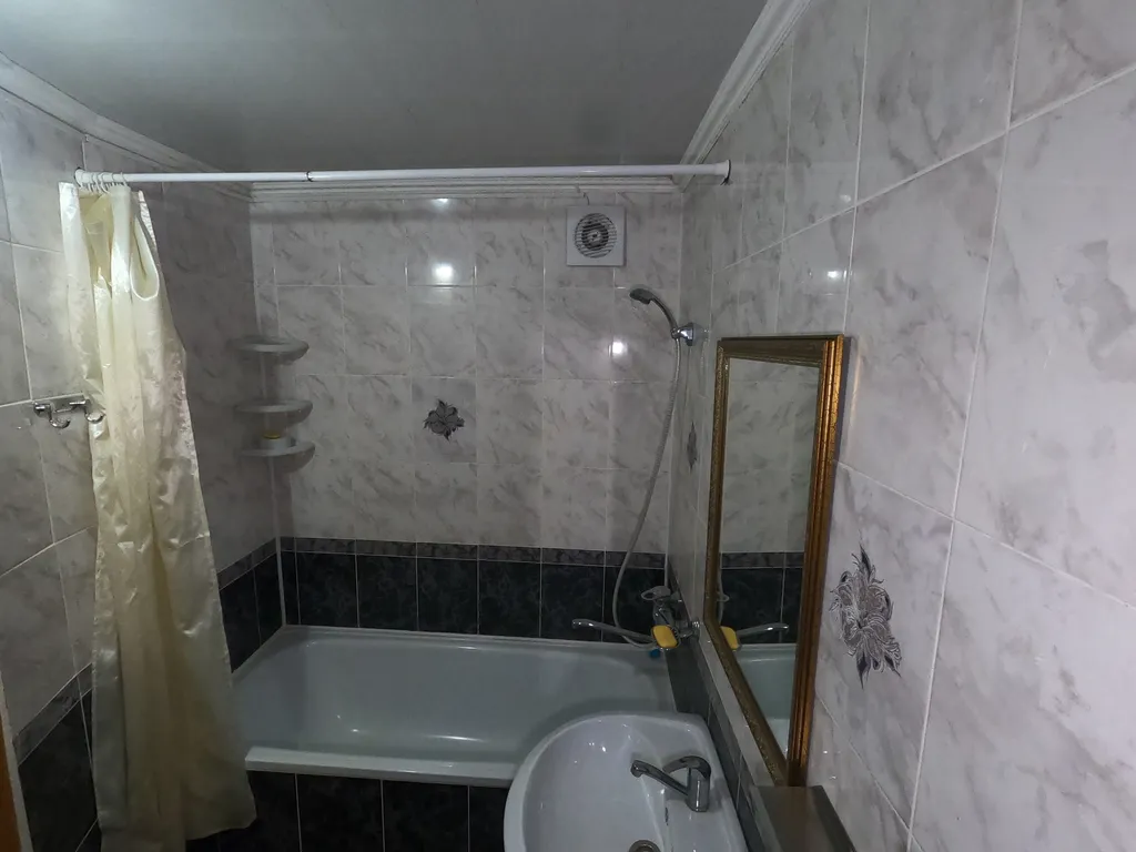 Трёхкомнатная квартира в сердце Домбая