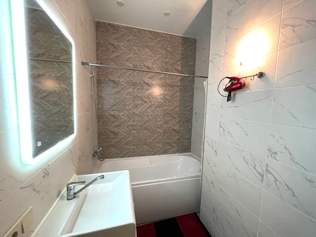 Стильная двухуровневая студия Лофт