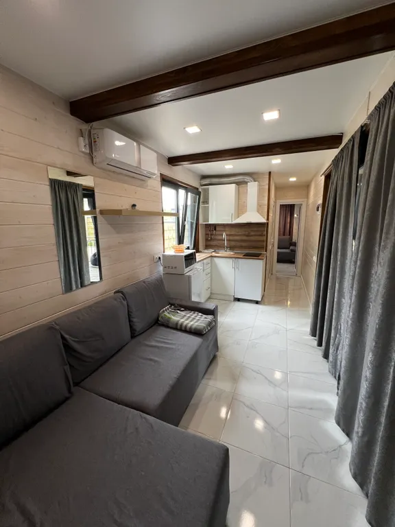 Домик в лесу с большой верандой