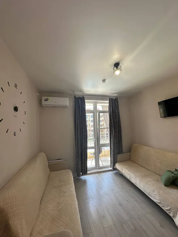 Уютная студия с видом на бассейны и горы