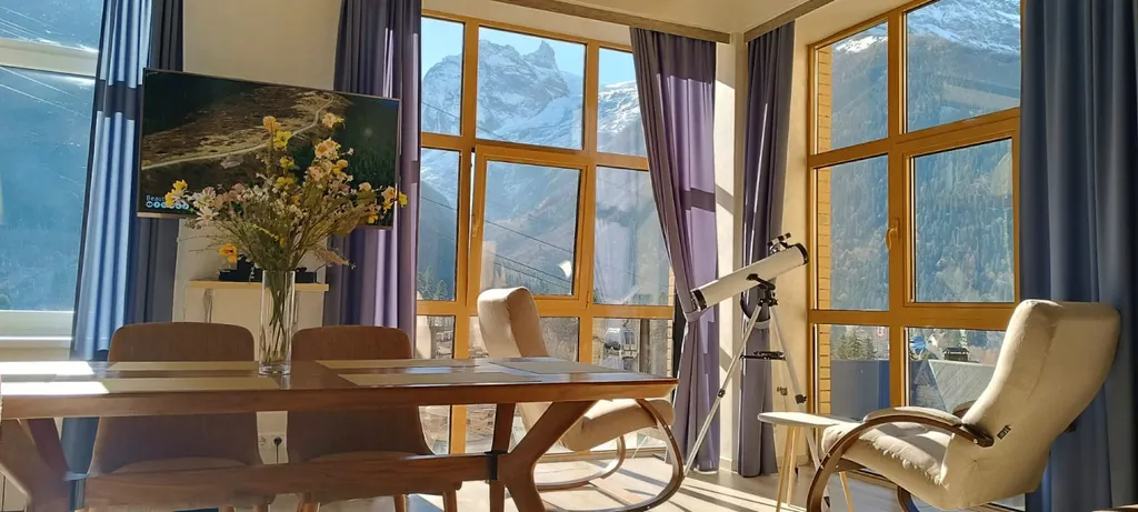 Апартаменты с восхитительными панорамными видами на вершины Домбая