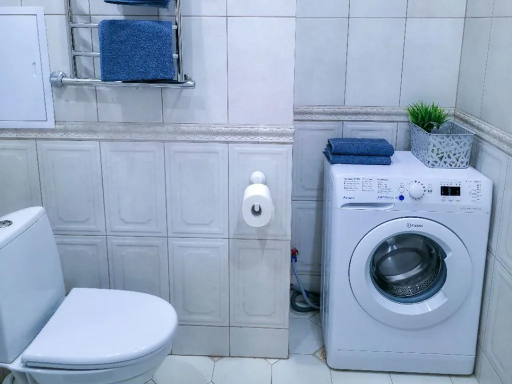 Уютная квартира с закрытым двором и парковкой (уютный дом)