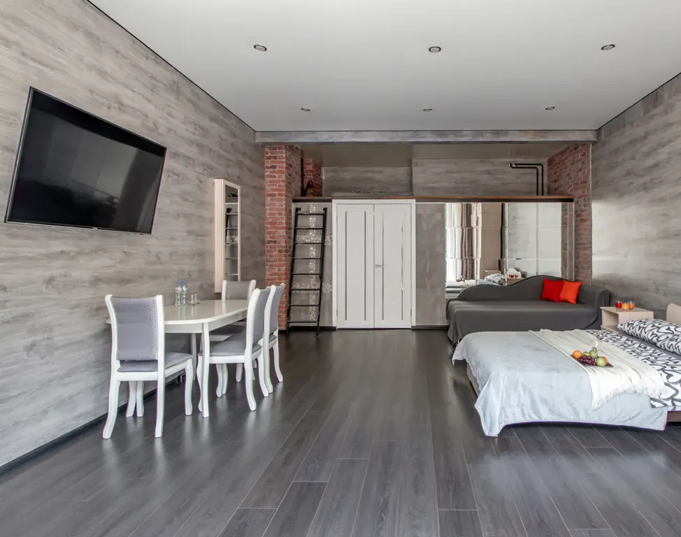 Дизайнерская двухуровневая квартира на Невском