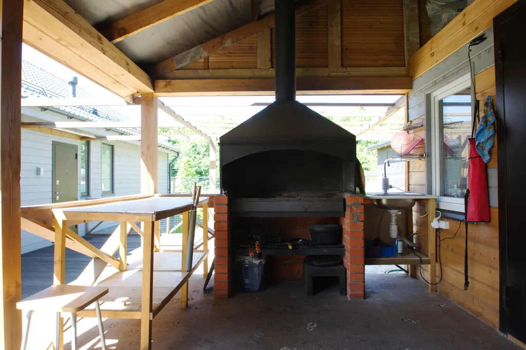 Стильный коттедж с баней и купелью