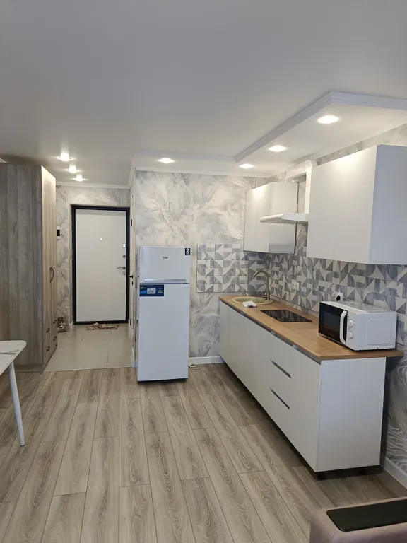 Уютная новая квартира студия с новой мебелью