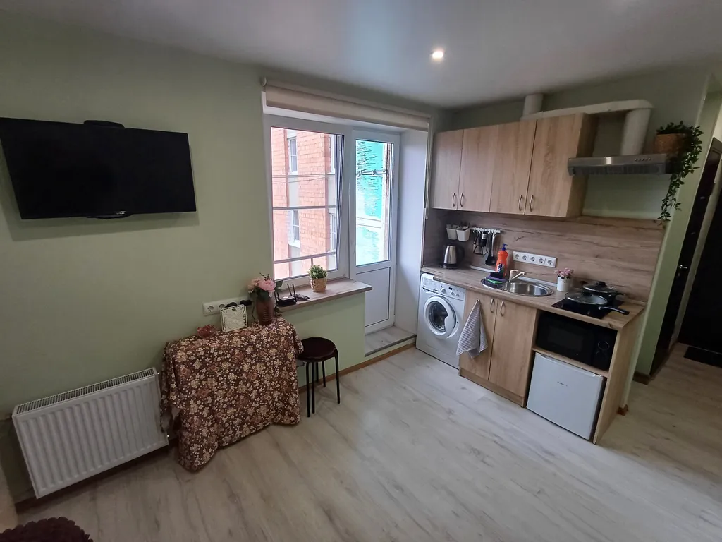 Уютные апартаменты на Нижегородской