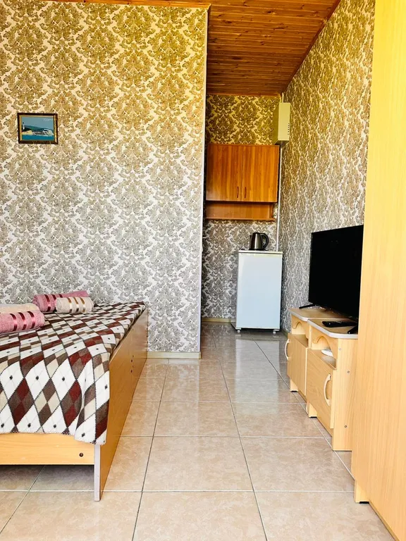 Недорогая комната с видом на горы