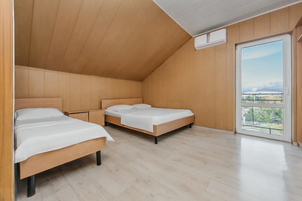 Семейный номер с 2-мя комнатами на 7 гостей