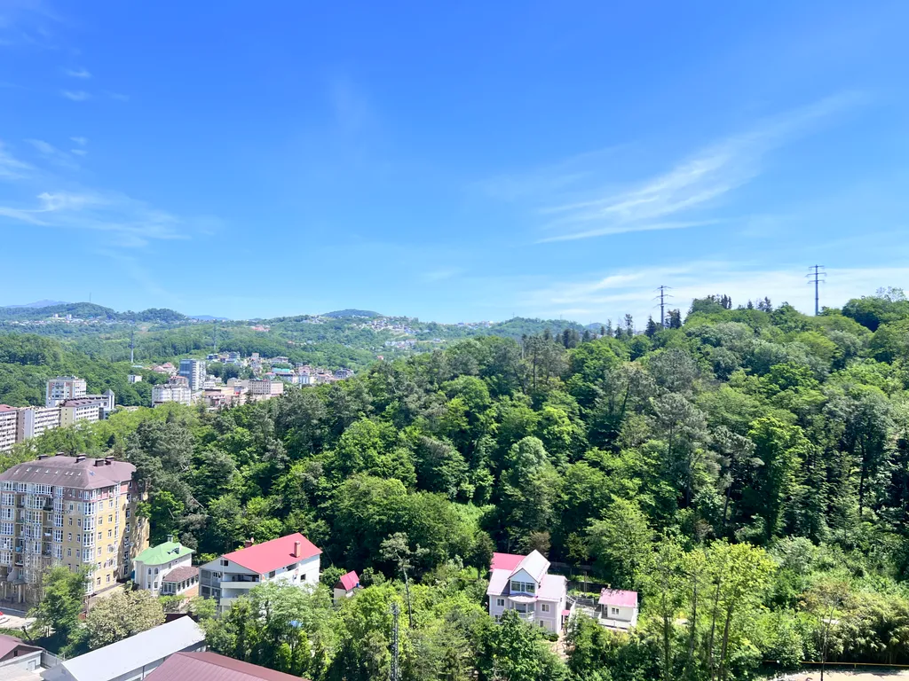 Уютная квартира в центре с балконом и видом на горы