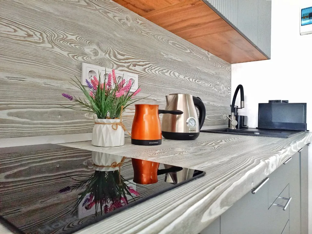 Комфортный семейный номер-студия с видом на горы