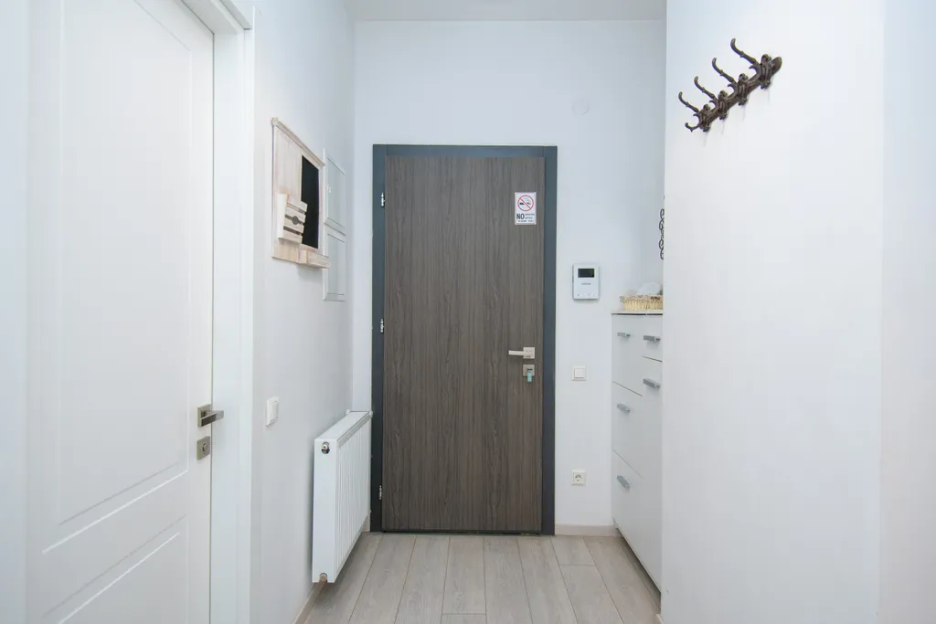 Уютные апартаменты с видом на колесо обозрения и город