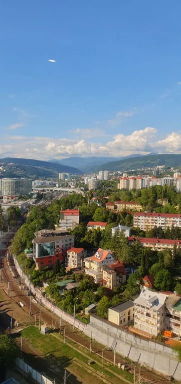 Квартира с видом на море, город, горы