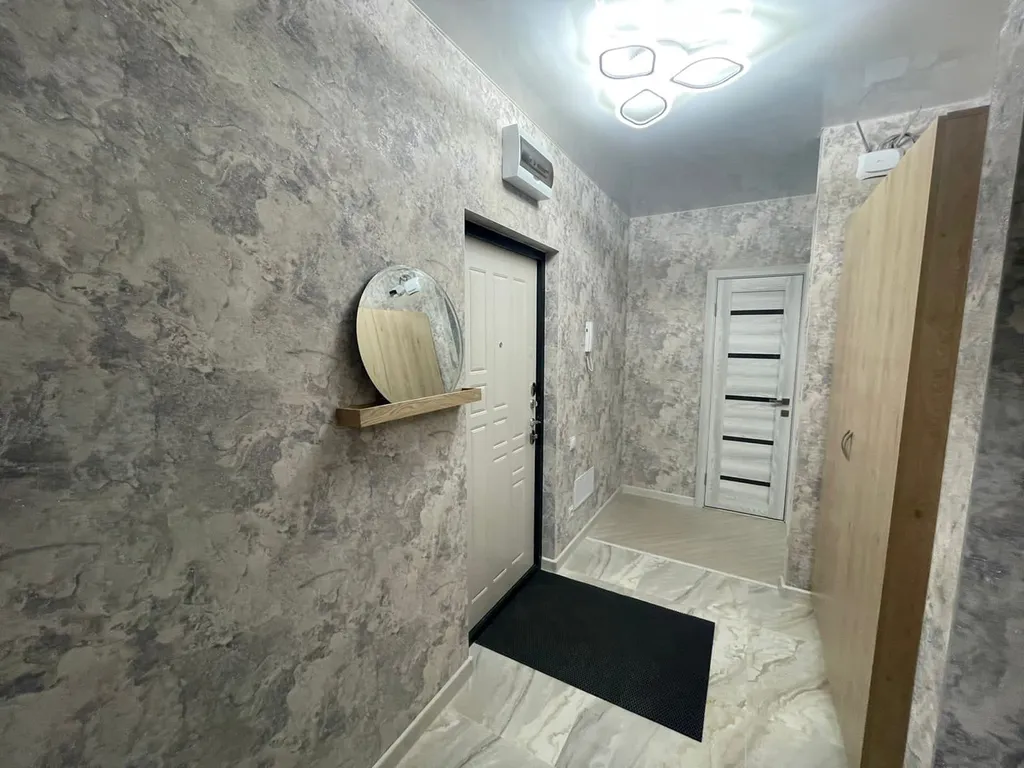 Новая, современная, уютная квартира в тихом районе города.