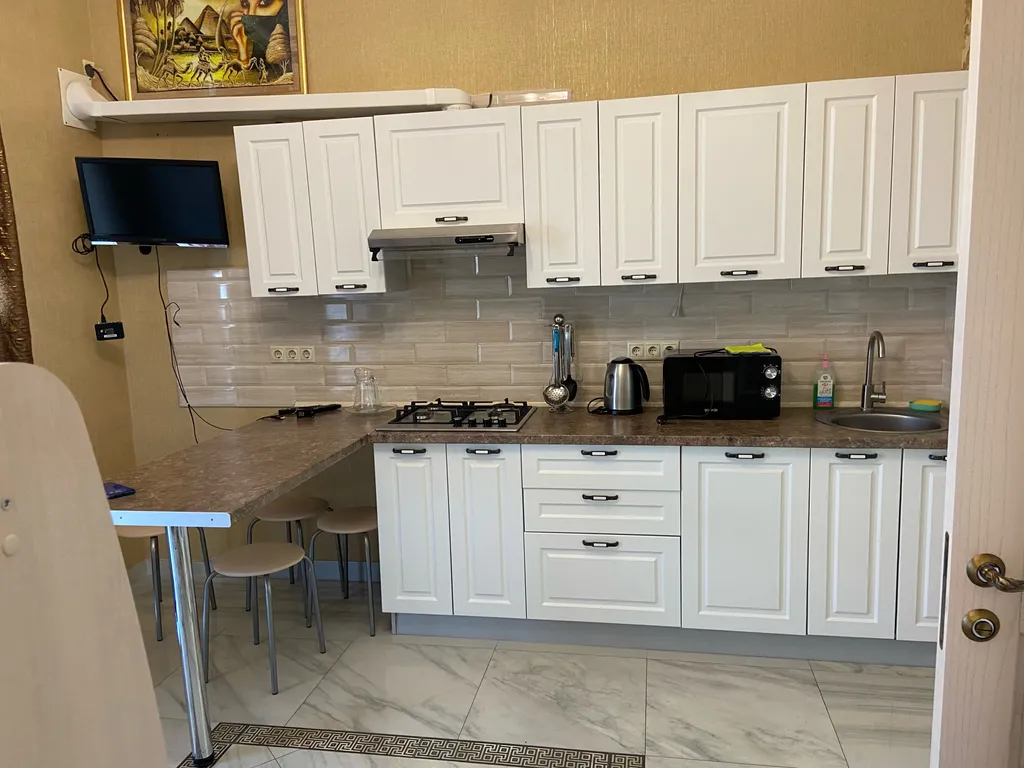 Апартаменты с личной террасой и кухней для семьи из 4 человек