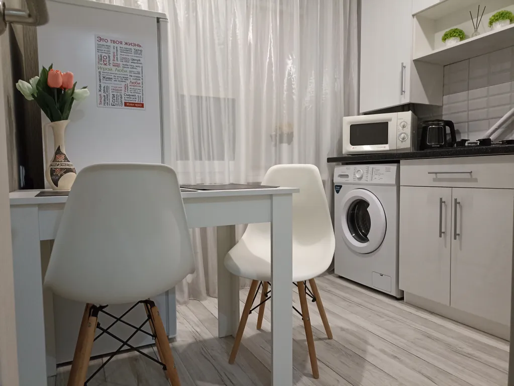 Квартира в центре на первом этаже с асфальтированной парковкой