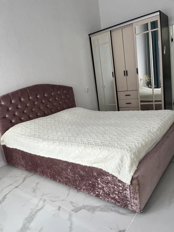 Светлая и уютная квартира с высокими потолками