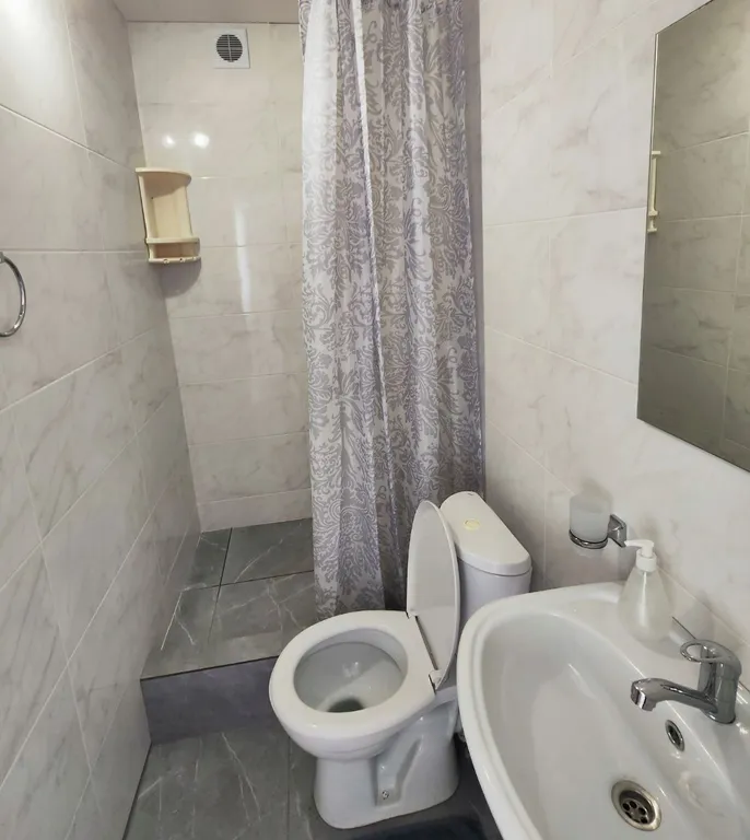 Апартаменты с 1 спальней на мансардном этаже гостевого дома Регион 86