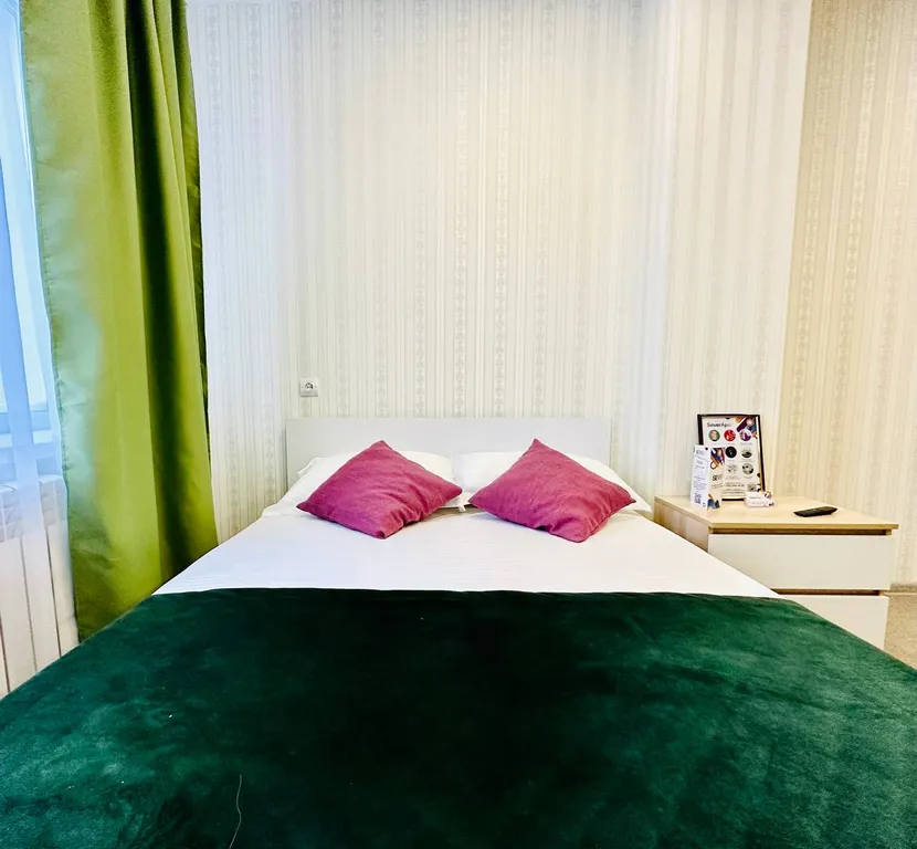 Двухместный номер с одной двуспальной кроватью