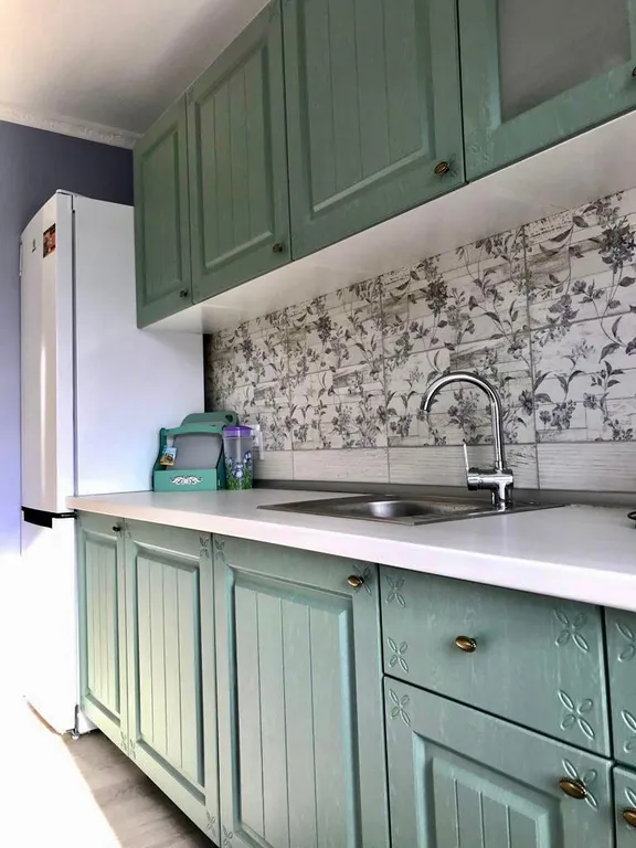 Квартира с зелёной гостиной