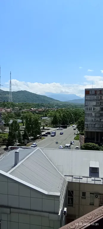 Квартира с видом на набережную и горы