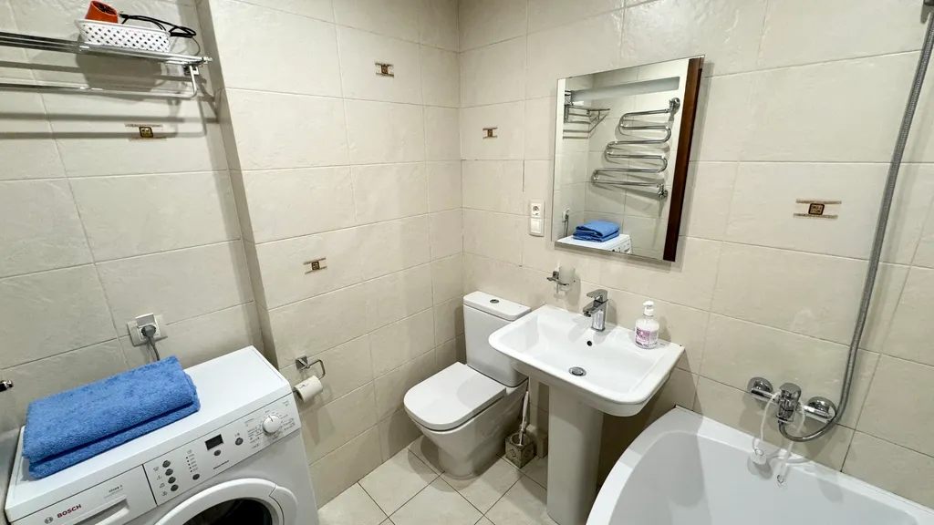 Двухкомнатная квартира в самом центре города с дизайнерским ремонтом