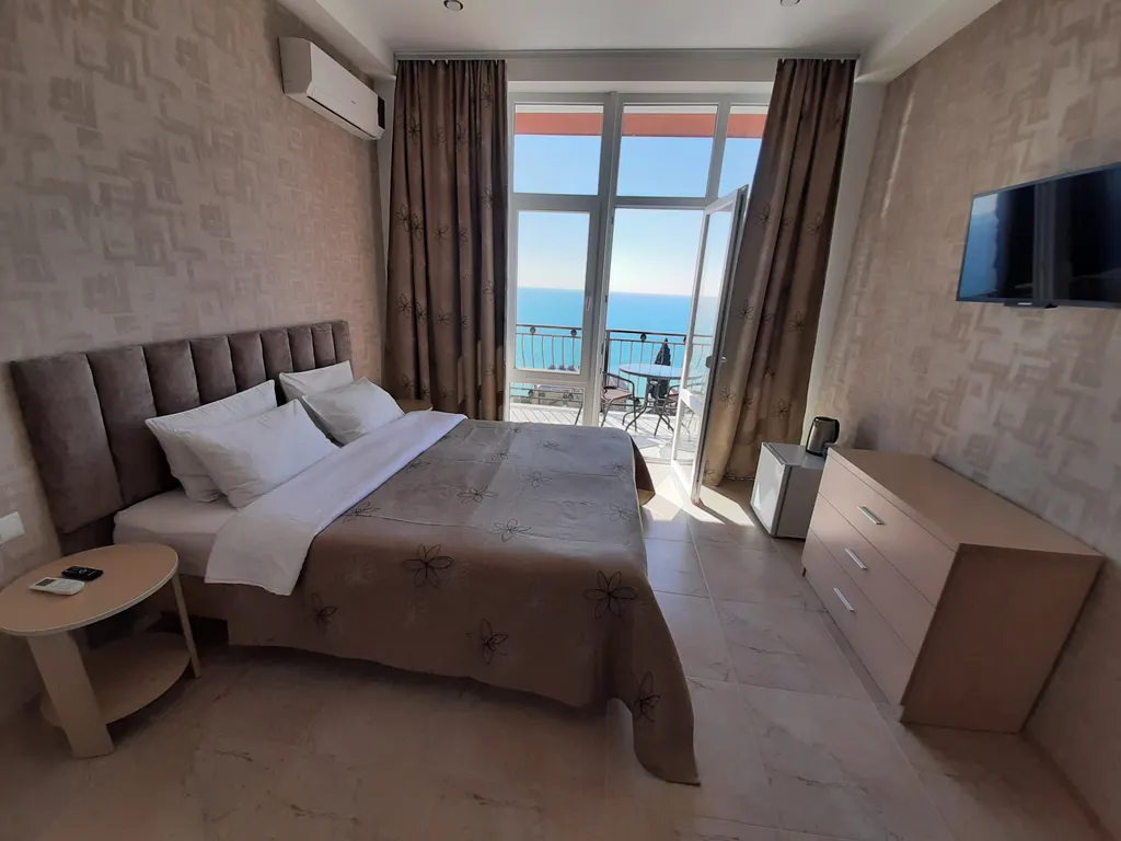 Люкс с балконом и панорамным видом на море