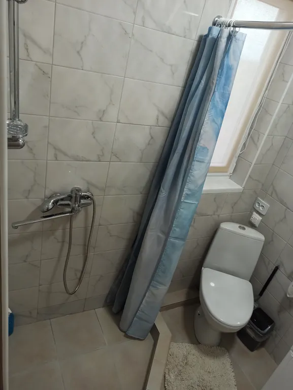 Комната с видом на море и горы