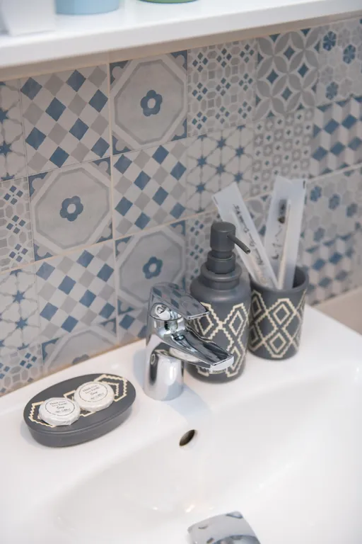 Уютные апартаменты с видом на колесо обозрения и город