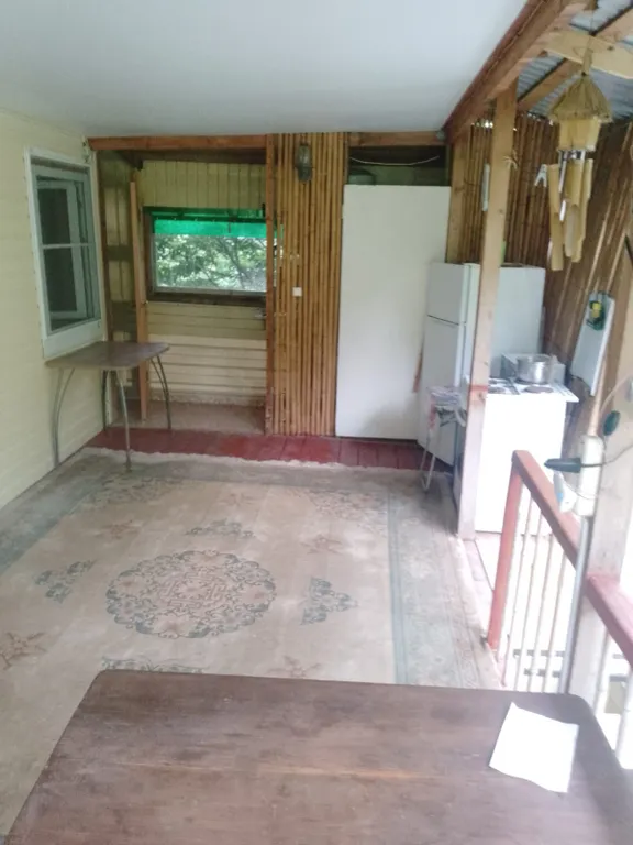 Комната у моря с видом на сад