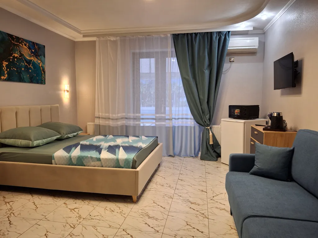 Большой четырёхместный люкс с выходом на бассейн 16